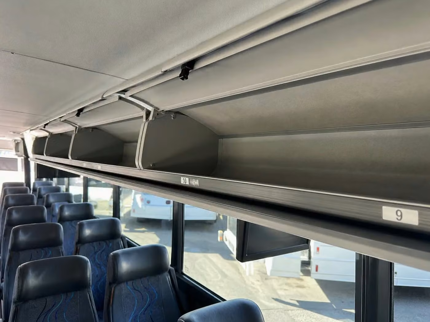 daphne 18 passenger minibus overhead storage