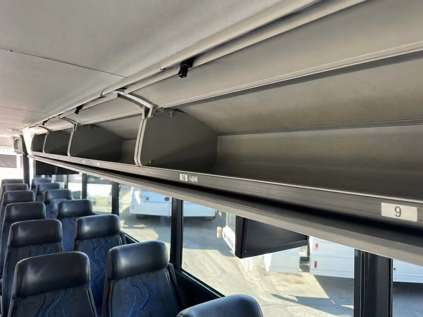daphne 28 passenger minibus overhead storage