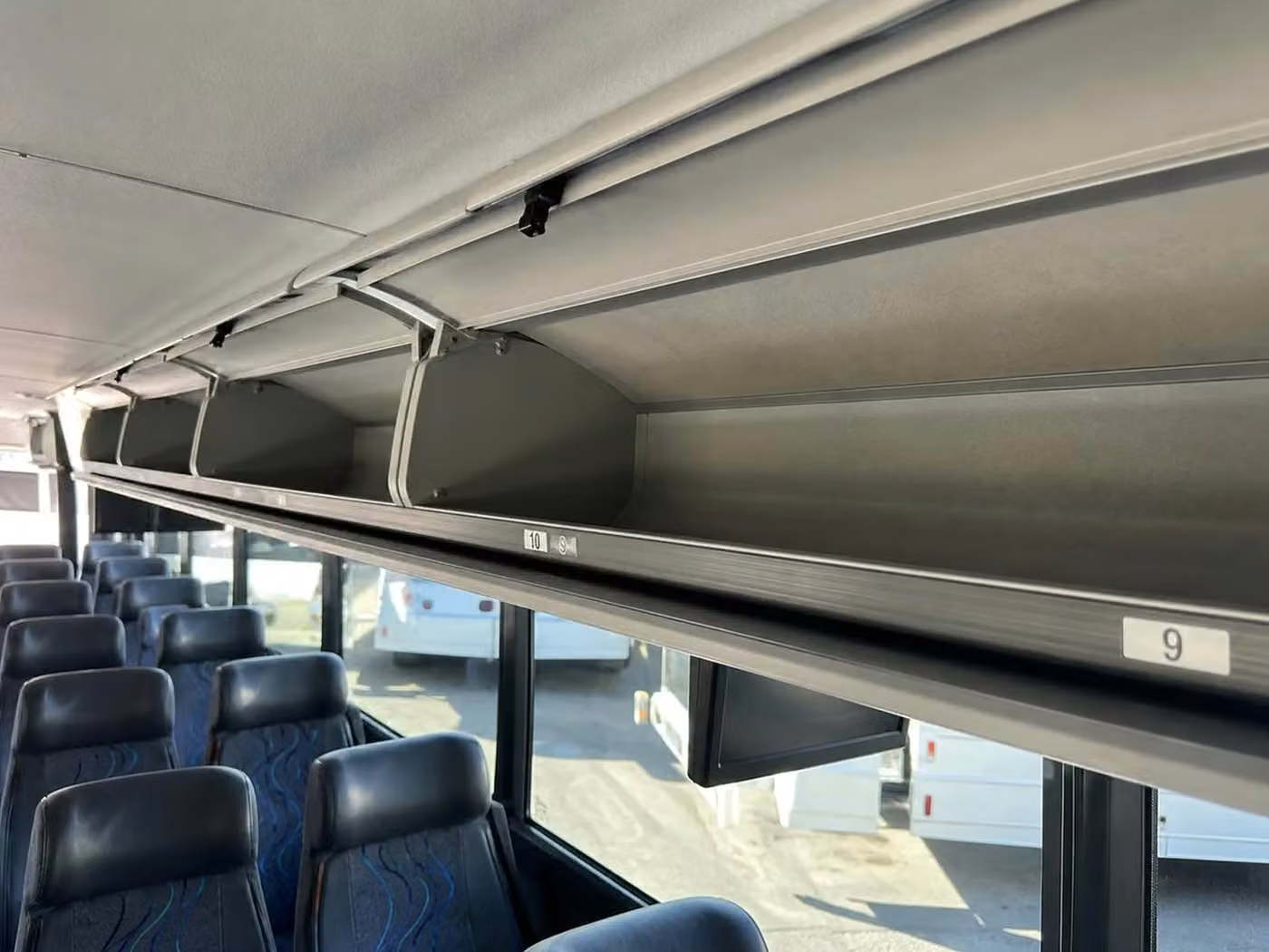 daphne 35 passenger minibus overhead storage