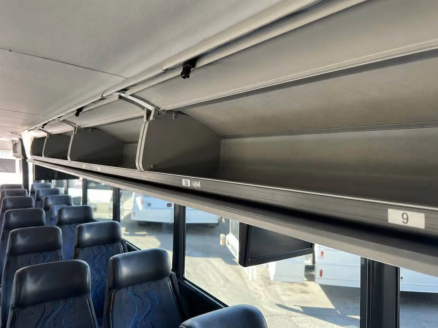 daphne charter bus overhead storage